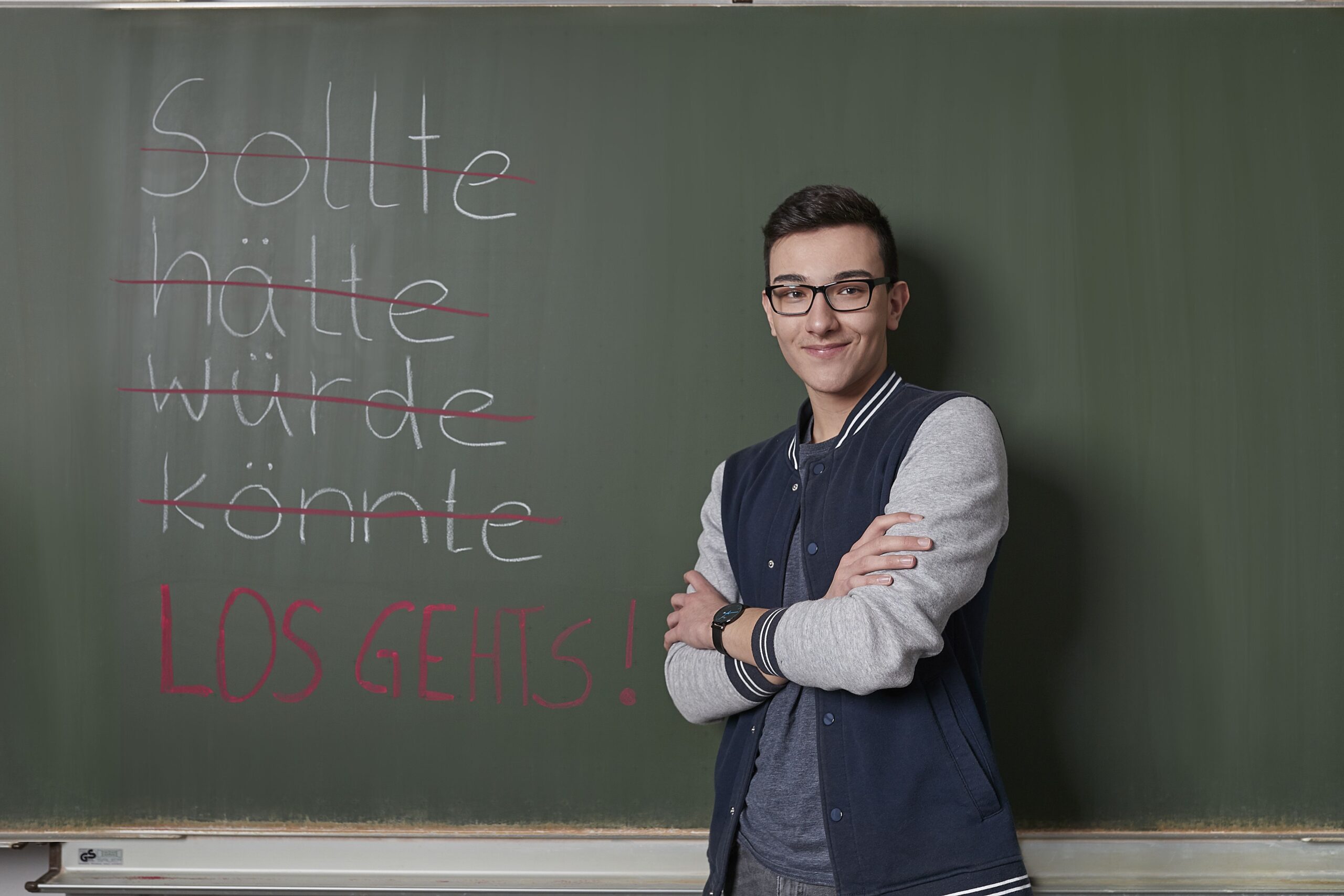 Schüler vor einer Tafel